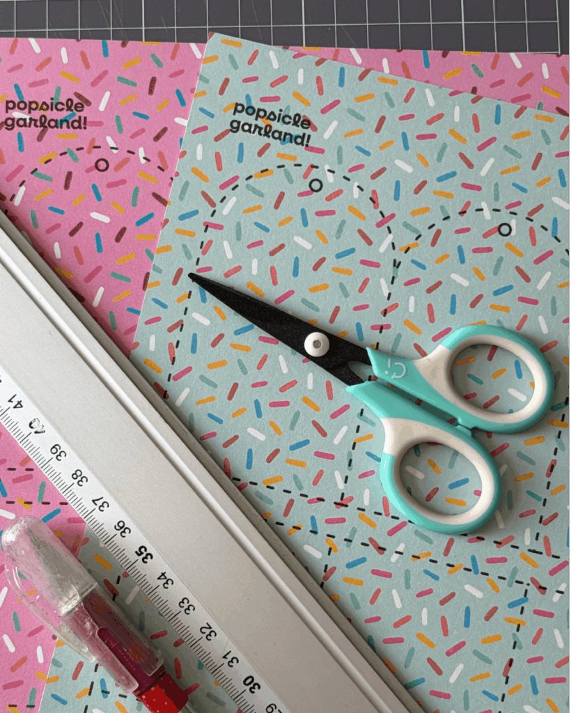 Carefully cut out the popsicles and coloured rectangles using scissors or a craft knife.