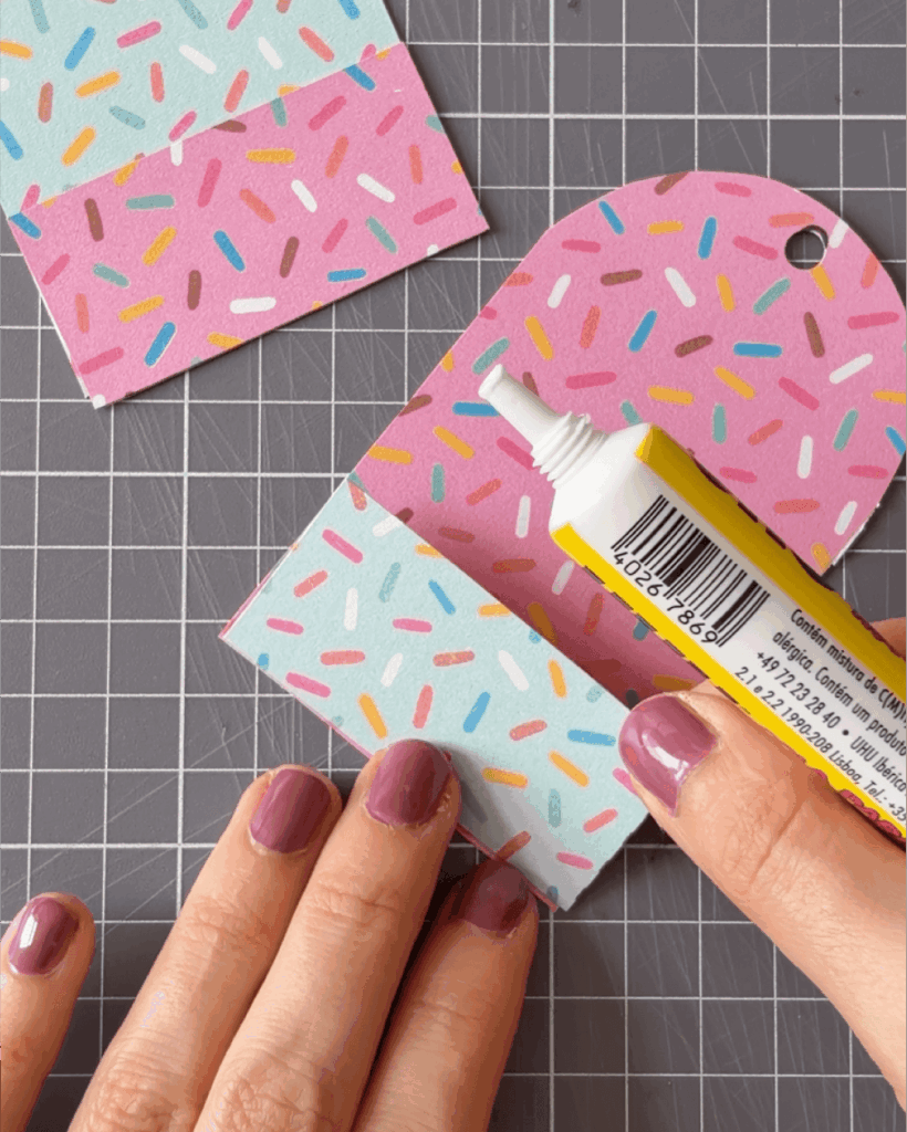 Glue the coloured rectangles onto the popsicles.